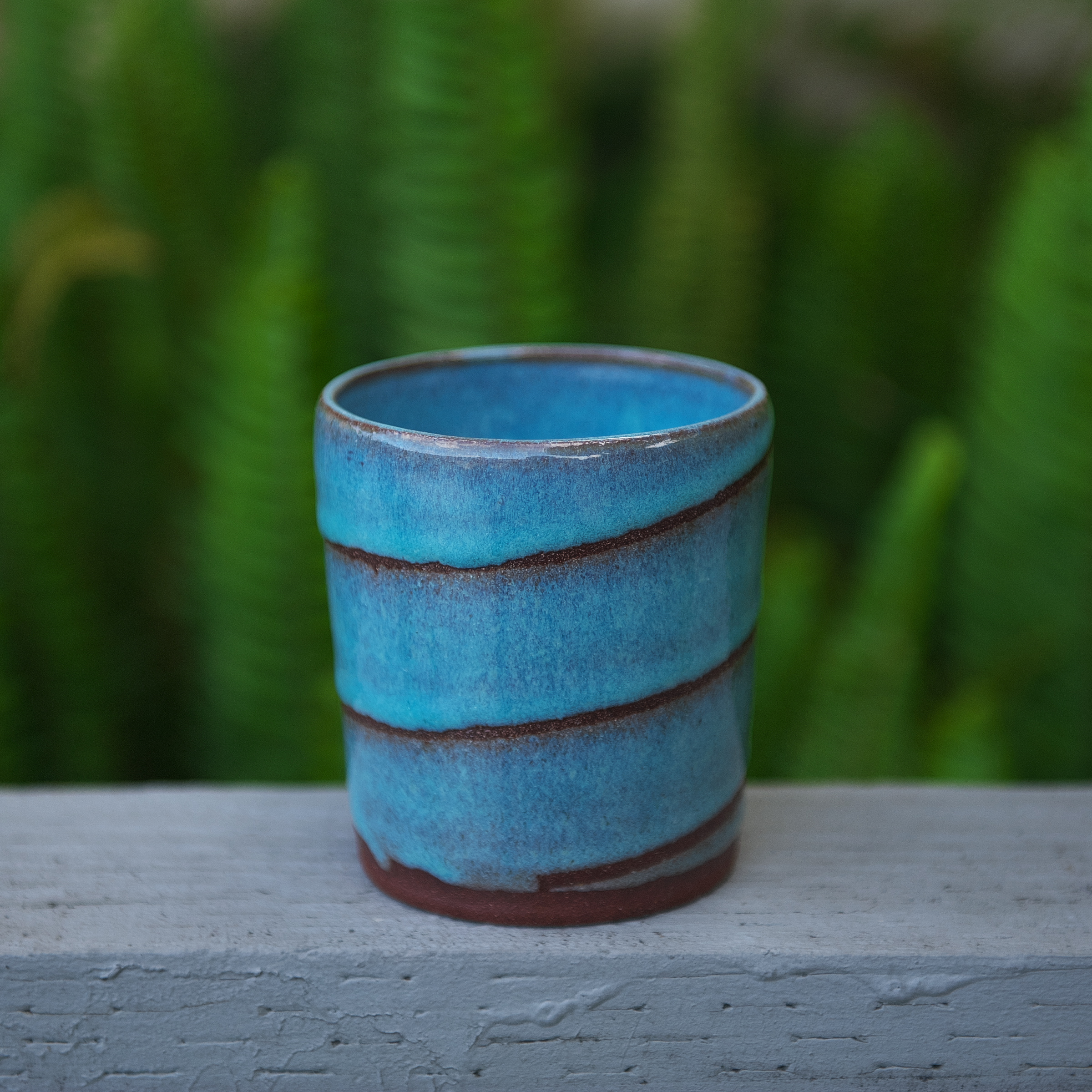 Shoal vessel in ocean blues